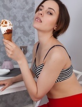 Pretty MILF eats ice cream and willingly shows hairy pussy