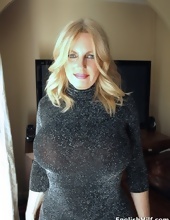 Blonde goddess shows hot mature tits and impressive buttocks