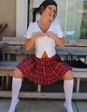 Comely brunette with twin tails seductively peels off her sexy uniform