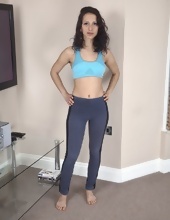 Sexy wife takes off yoga outfit and touches hairy snatch on the floor