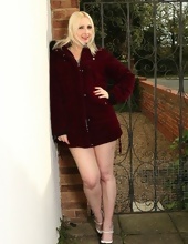 Outdoor galleries of long-legged blonde mom touching pussy near fence