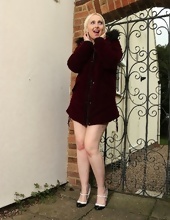Outdoor galleries of long-legged blonde mom touching pussy near fence