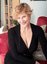 Cougar with big tits has her shaved pussy penetrated with hard phallus
