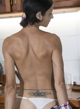 Skinny mom undresses in kitchen to show her small boobs and sweet bush