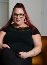 Glasses-wearing BBW chick striking very thoughtful poses