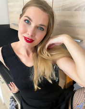 Teaser in the kitchen is going to show her perfect pussy
