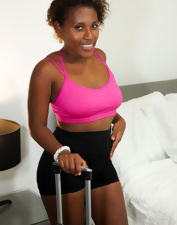 Black woman with natural boobs bending over on camera