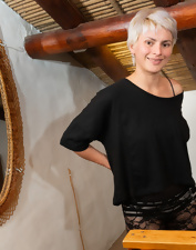 Petite chick with a cute face shows her tight wet pussy