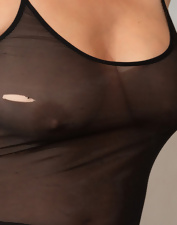 Petite chick with a cute face shows her tight wet pussy