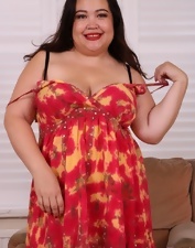 Fat brunette woman from Asia posing like a slut here