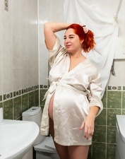 XXX album of a pregnant woman who plays with her pussy