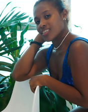 Slutty ebony wench is naked as she flirts with the camera