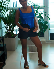 Slutty ebony wench is naked as she flirts with the camera