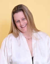 Woman in her cougar age is playing with her thick old body