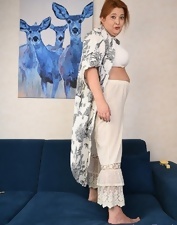 Curvy Redhead Stripping Nude Gallery