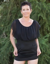 Nude GILF Squat And Flash Photo Gallery