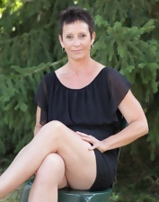 Nude GILF Squat And Flash Photo Gallery