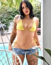 Tattooed Bikini Babe Poolside Gallery