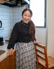 Mature Milf Kitchen Tease Photos With Young Man